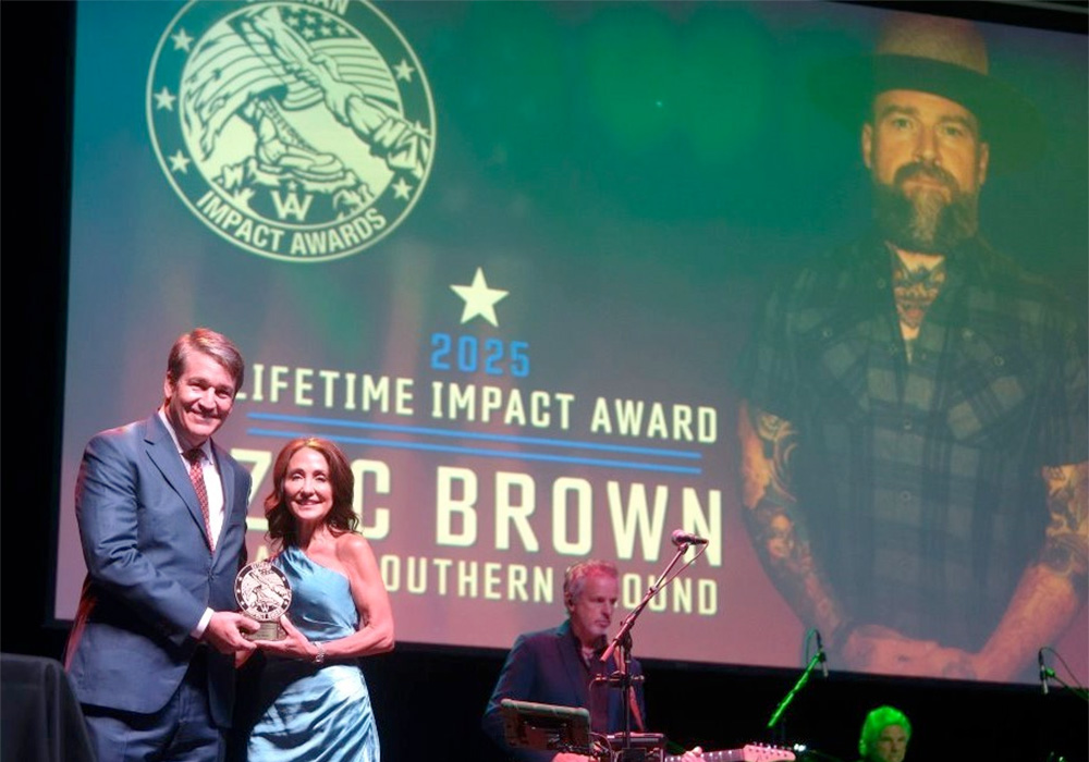 Mike-Accepts-Award-ZB-1000x700