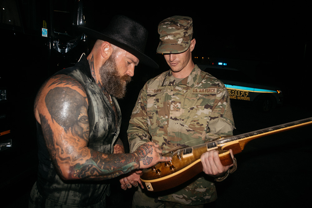 Zac-signing-soldier-guitar